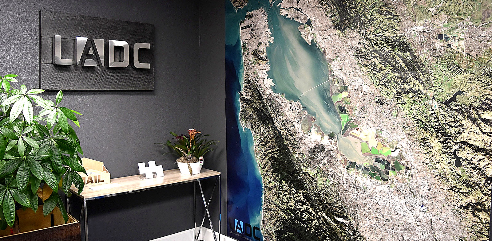 LADC studio reception with the LADC wall sign